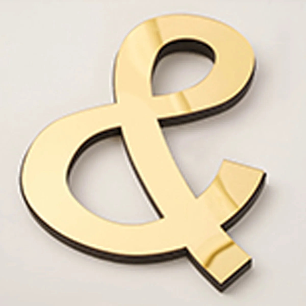 Gold acrylic mirror letter wall sticker shaped like an ampersand
