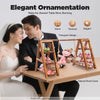 A couple is admiring a wooden triangular display stand used for elegant ornamentation on a dessert table.