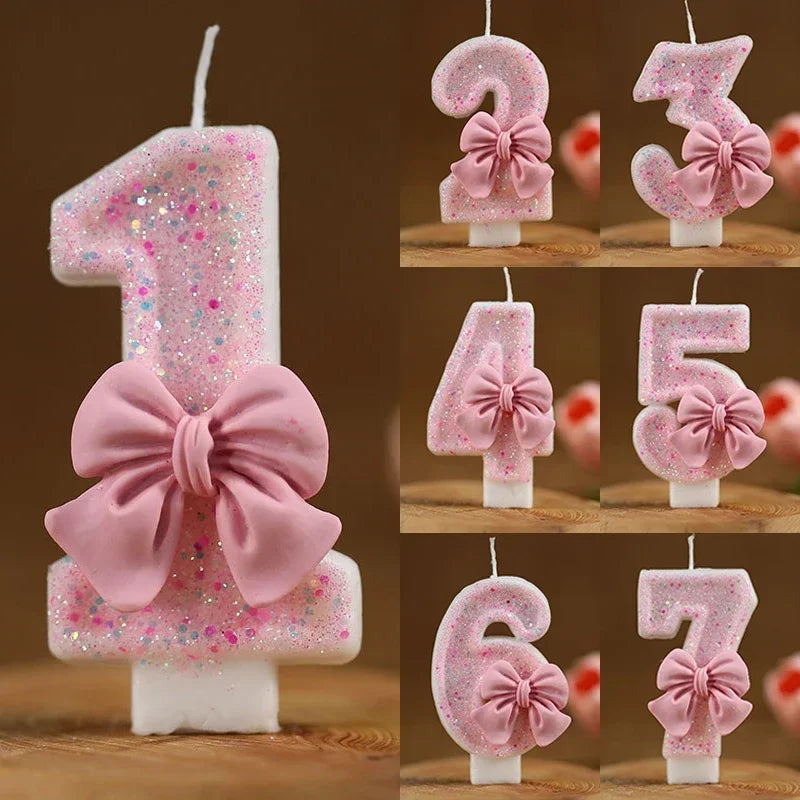 Un juego de toppers para pastel de números de brillo rosa, mostrando del uno al siete