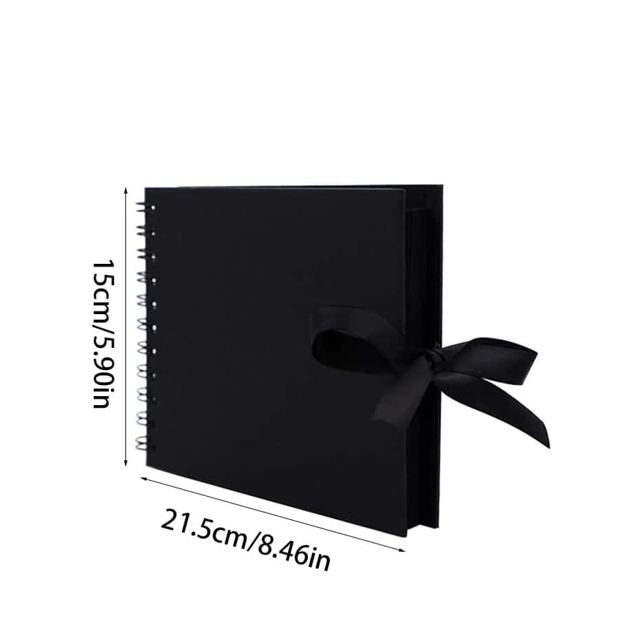 Álbum de fotos de memoria DIY negro con cierre de cinta.