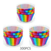 A bulk pack of colorful rainbow disposable cupcake liners in a clear plastic container.