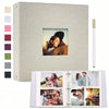 A linen 3-ring scrapbook album with a light beige cover and a framed photo featuring a woman looking at a dark-haired person.