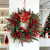 A festive wreath made of artificial pine and eucalyptus greenery adorned with bright red berries.