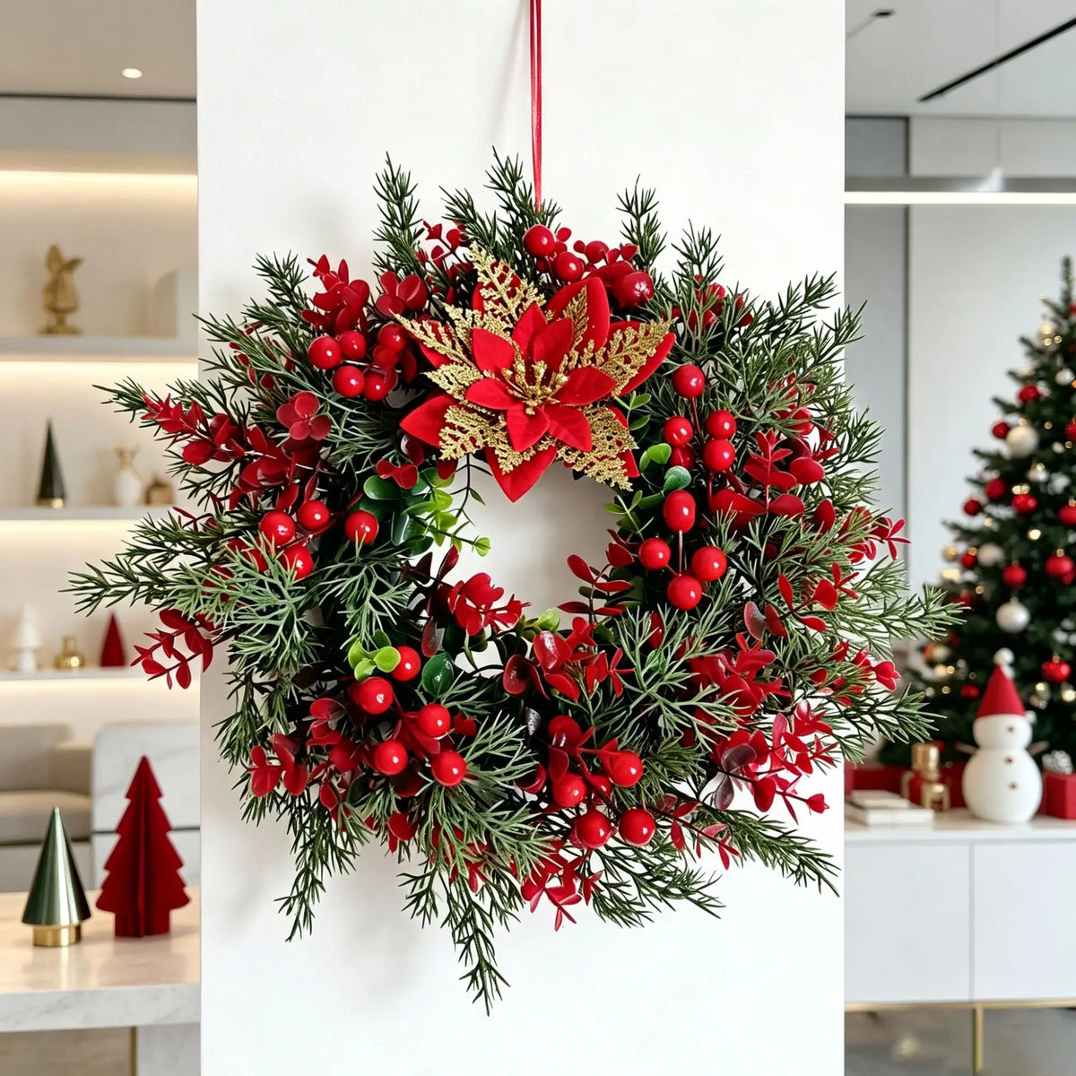 A festive wreath made of artificial pine and eucalyptus greenery adorned with bright red berries.
