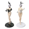 A collectible figure of an anime-style mechanic girl with white hair and black accents, standing on a black base.