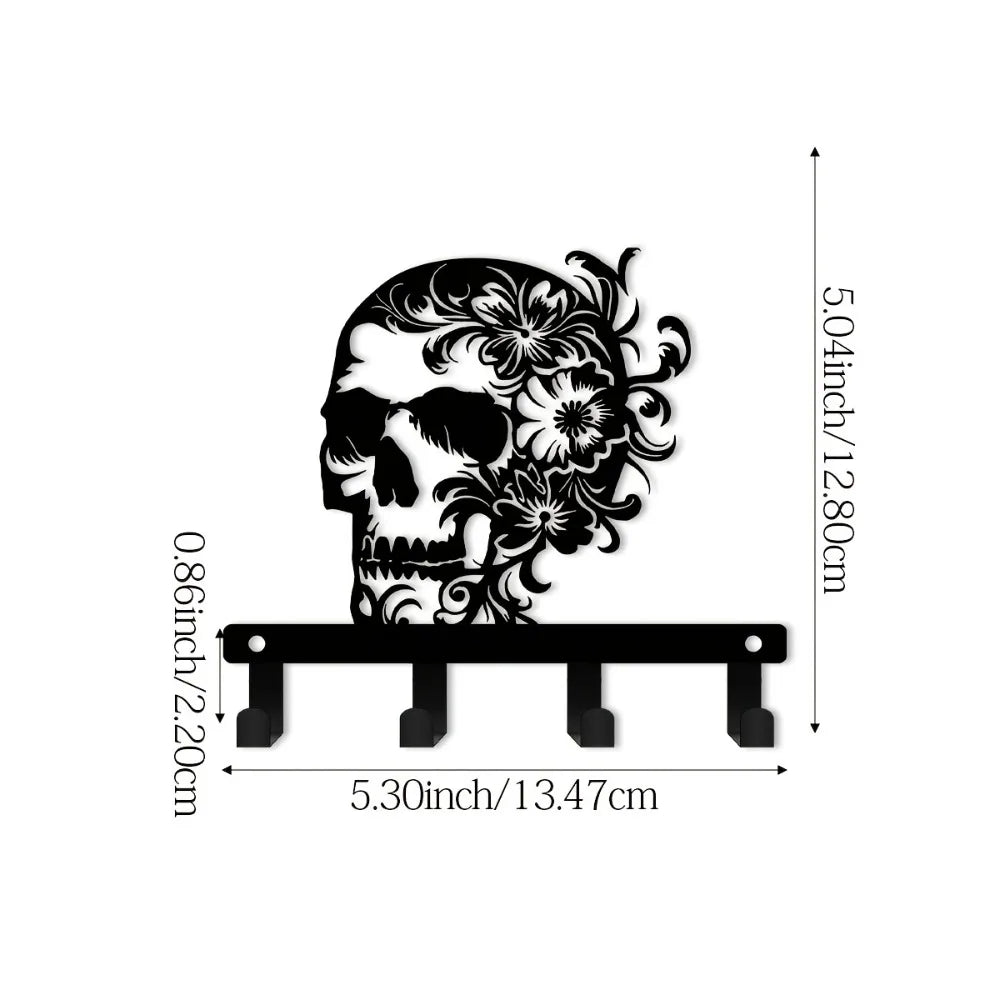 Black iron skull wall hook with floral accent and a wooden plank for display