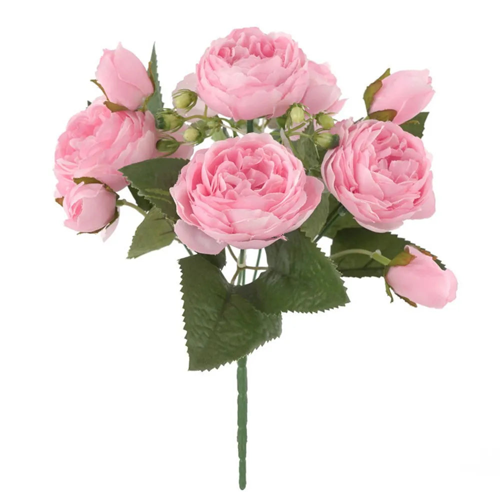 Ein Strauß rosa künstlicher Seerosen und Pfingstrosen auf einem grünen Stiel.