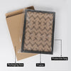 A classic wooden photo frame is shown inside a protective bag and placed next to its cardboard packaging box.