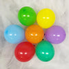 A collection of seven vibrant latex balloons in colors including green, yellow, blue, orange, purple, and red.