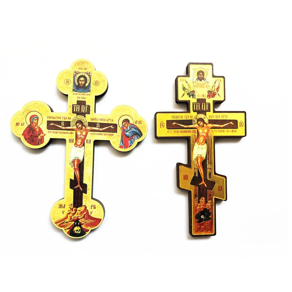 Handcrafted wooden Orthodox cross wall decor featuring religious iconography and painted details.