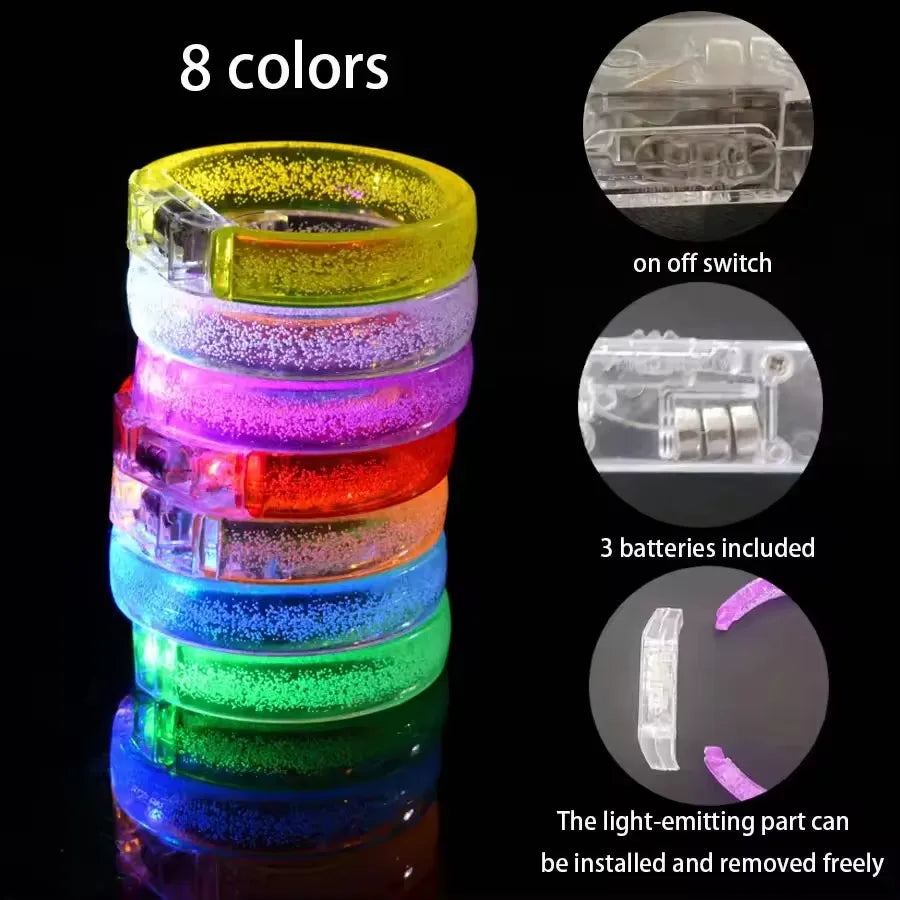 A stack of eight colorful LED flash bracelets, showing various colors and components like switches and batteries.