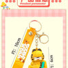 A yellow cartoon cat pendant keychain featuring the Garfield character on a gold-colored tag.