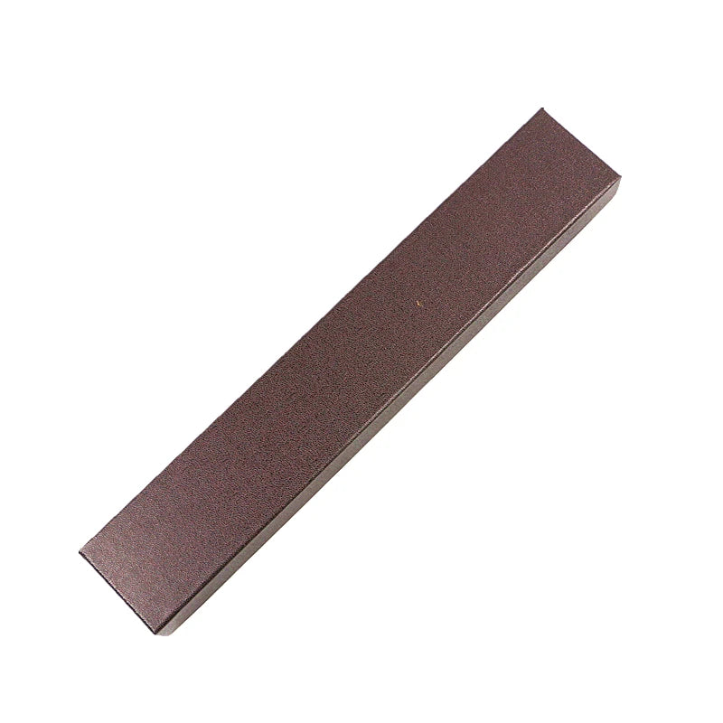 A rectangular, dark brown metal magic wand replica for collectors and cosplay.