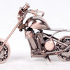 A handcrafted metal motorcycle model with a silver finish displayed against a white background.