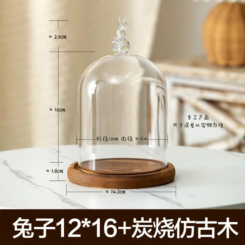 Glass aromatherapy candle holder with a clear dome and a wooden base for dust-proof storage