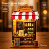A DIY hand-assembled puzzle of a street-corner bakery shop with an awning and various coffee items.