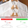 White shirt hanging on a wooden hanger with notice about hanger size compatibility