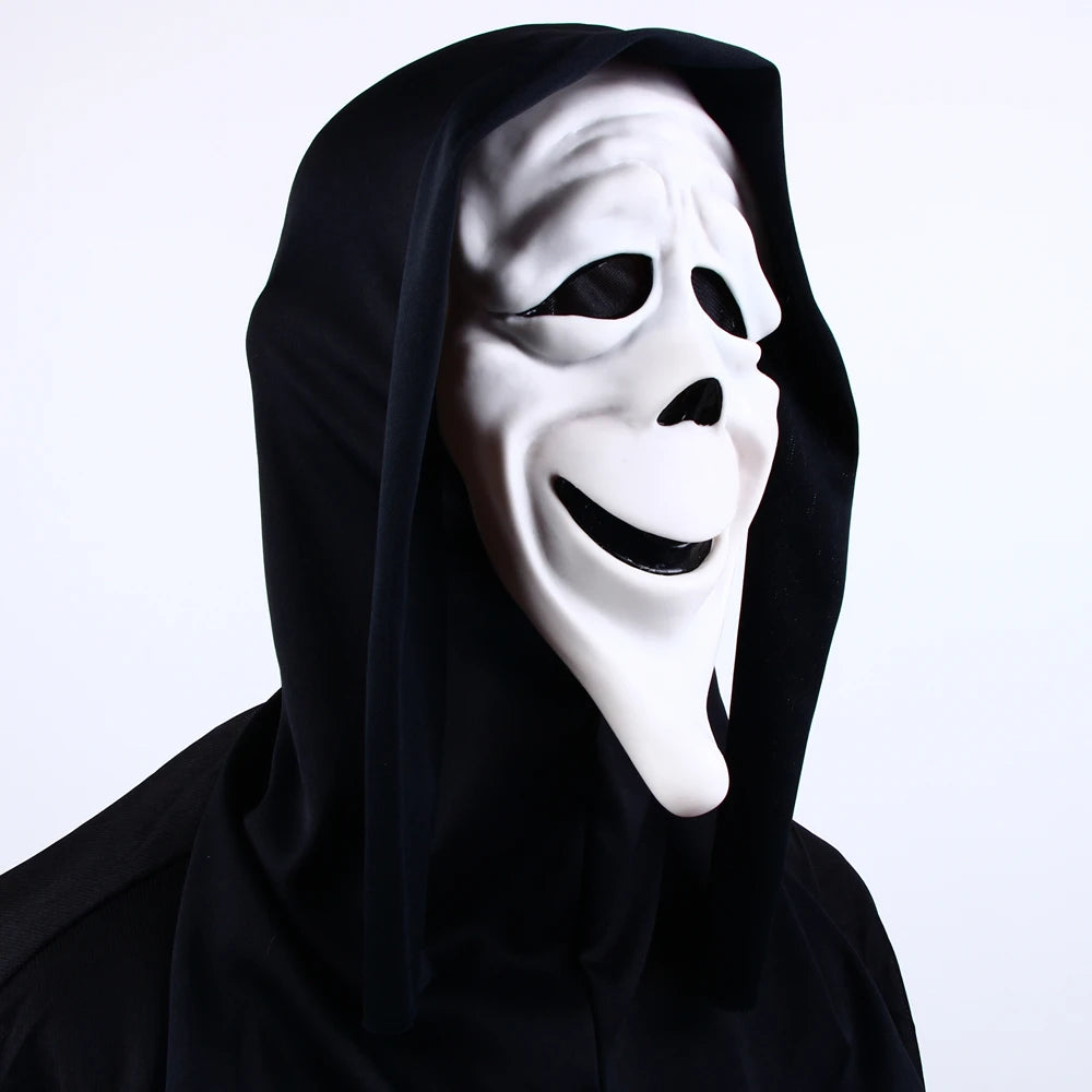A white screaming skeleton horror mask with a black hood and grin.