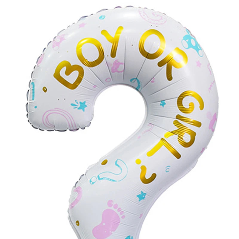 A white foil balloon shaped like a question mark with the words BOY OR GIRL written in gold and pastel colors.