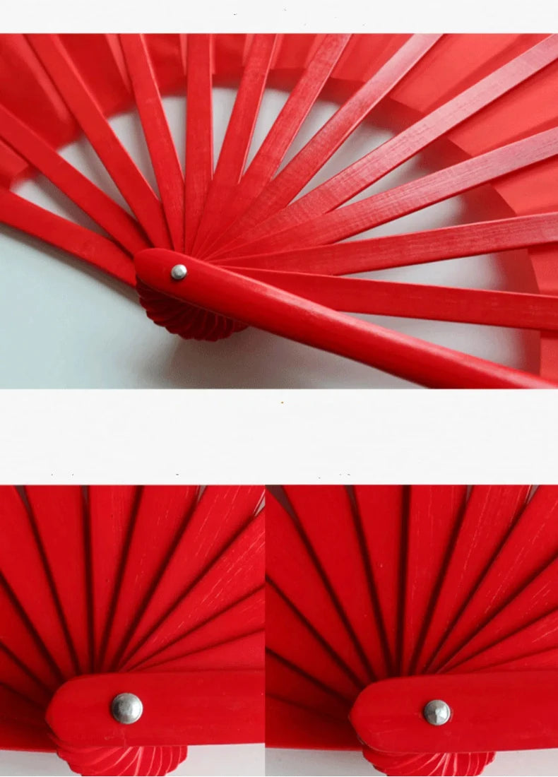 A close-up view of a red bamboo folding fan with multiple slats, showing the mechanism and color.