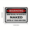 A black and red warning sign with white text that reads Behind This Door I May Or May Not Be Naked Enter At Your Own Risk