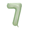 A light green foil number balloon shaped like the numeral 7.