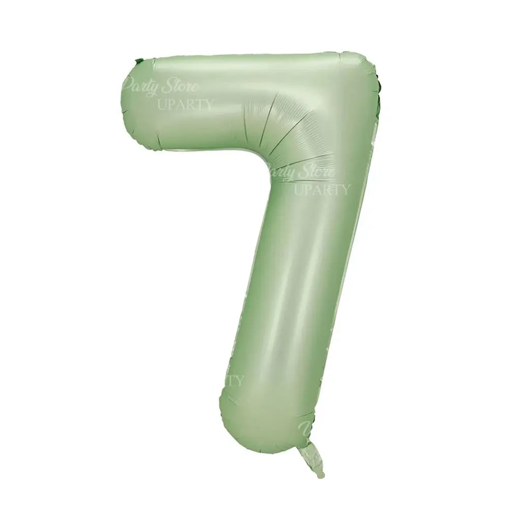 A light green foil number balloon shaped like the numeral 7.