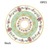 A set of 10 vintage floral paper party tableware including plates, cups, and napkins with gold accents.