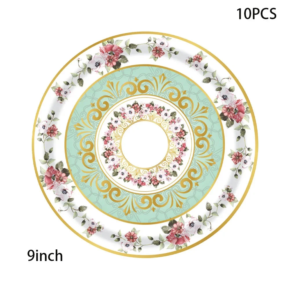 A set of 10 vintage floral paper party tableware including plates, cups, and napkins with gold accents.