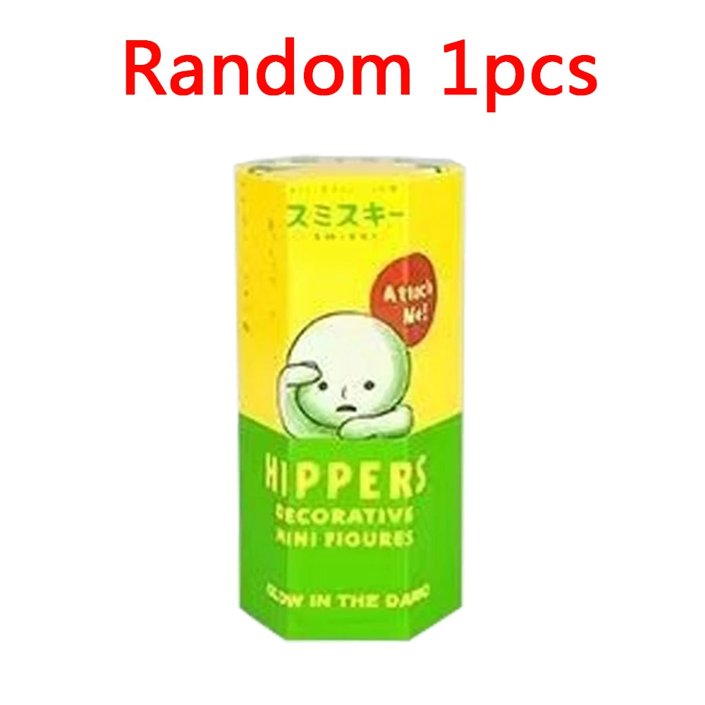 A yellow blind box figure of a white animal character with Japanese text and the brand Hippers