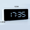A black LED digital alarm clock displaying 7:35, with dimensions of 12cm by 4.8cm.