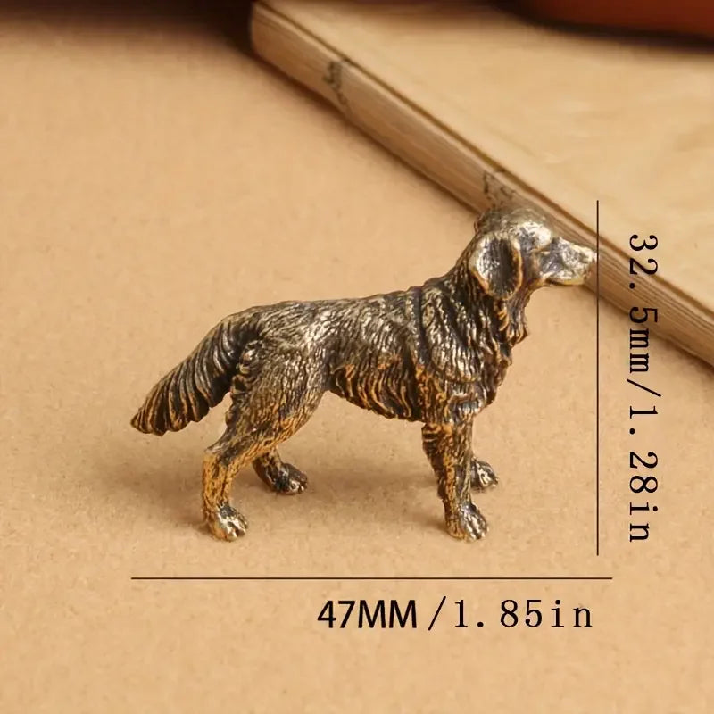 A handcrafted brass rooster figurine standing on a brown surface.