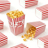 Red and white striped boxes filled with popcorn and snacks