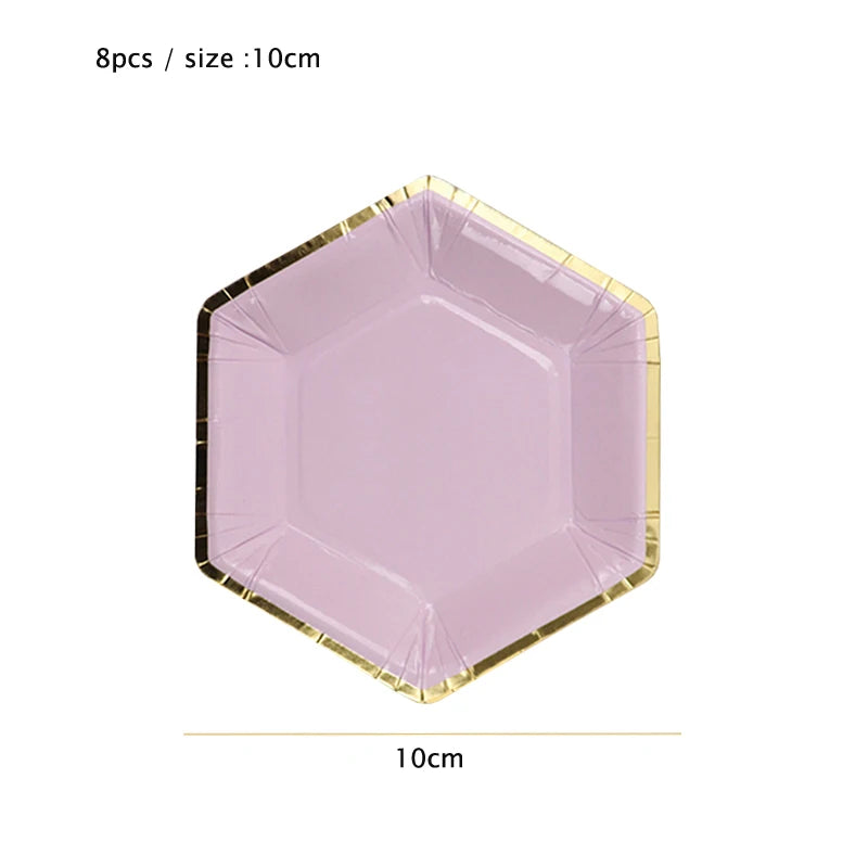 A hexagonal purple plate with a gold rim, shown from above.