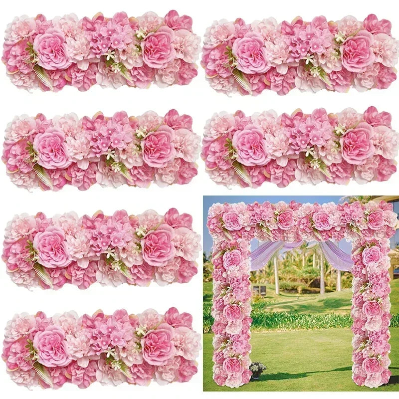 A close-up display of artificial silk pink and magenta rose flower panels used for weddings and events.