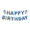 A banner made of blue shark foil balloons spelling out HAPPY BIRTHDAY for an ocean-themed party decoration.