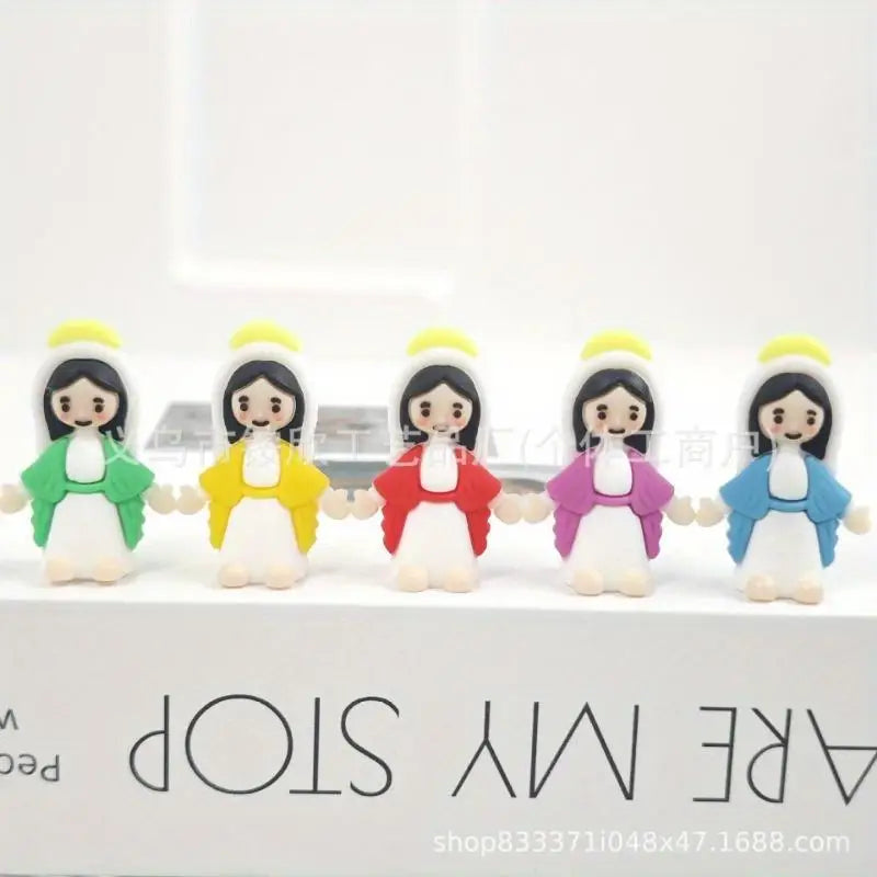 Five mini resin statues of the Virgin Mary with yellow halos and green, yellow, red, purple, and blue robes.