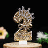 Gold glitter number cake topper featuring a horse design with rhinestones and a bow
