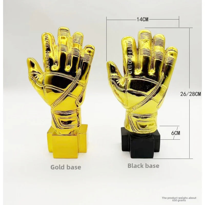 Golden gloves award trophy with a gold hand and a black base.