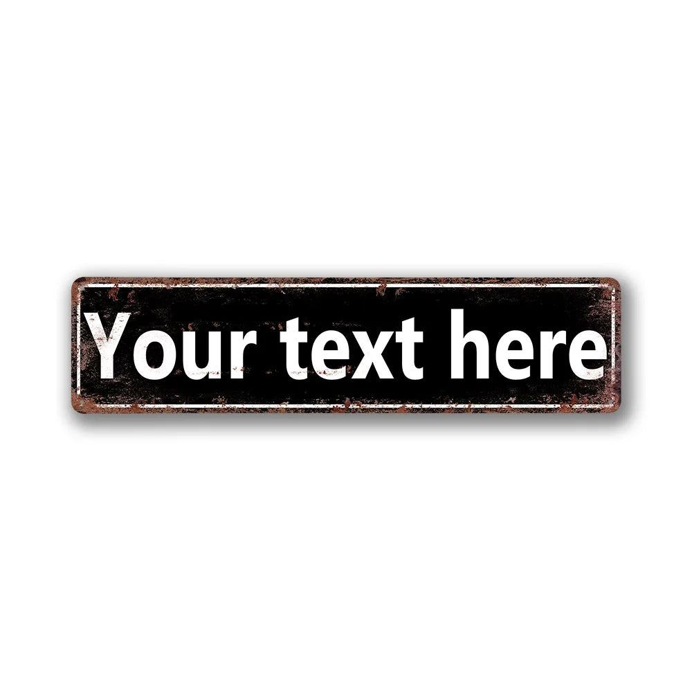 A rectangular, distressed vintage tin sign with the text Your text here on a dark background.