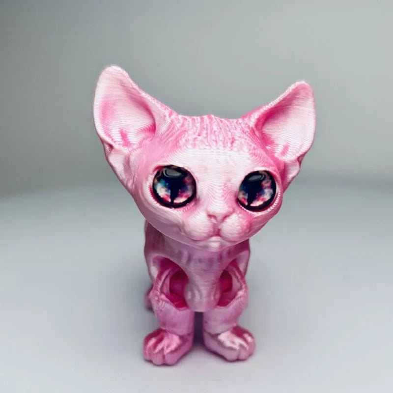 A pink articulated 3D printed figurine of a Siamese cat with large blue eyes.