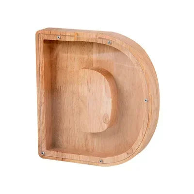A light wood alphabet piggy bank coin box with a rounded, square shape.