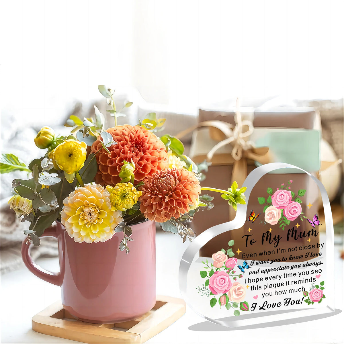 A pink acrylic heart plaque with a floral design and 'To My Mum I Love You' message