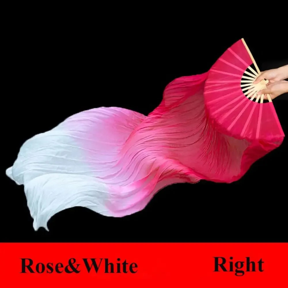 A pink and white gradient silk ribbon dance fan is being held, showing its pleated texture.