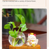 Mini resin desk ornament featuring a glass vase with green ivy and a small white lucky cat figurine