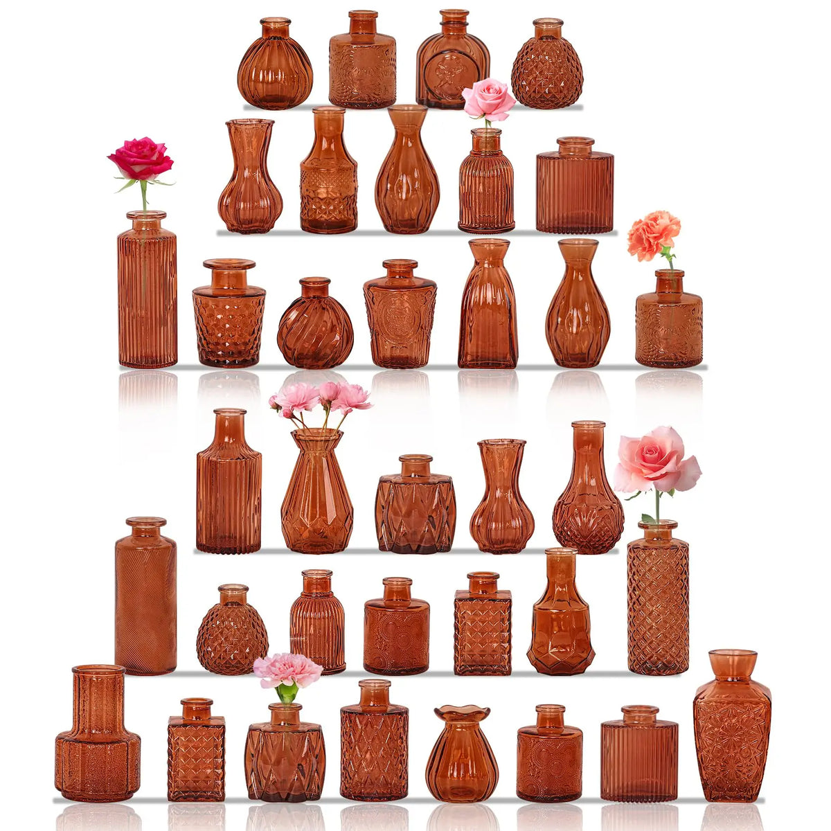 A collection of vintage bud glass vases in various sizes and earthy brown tones arranged vertically.