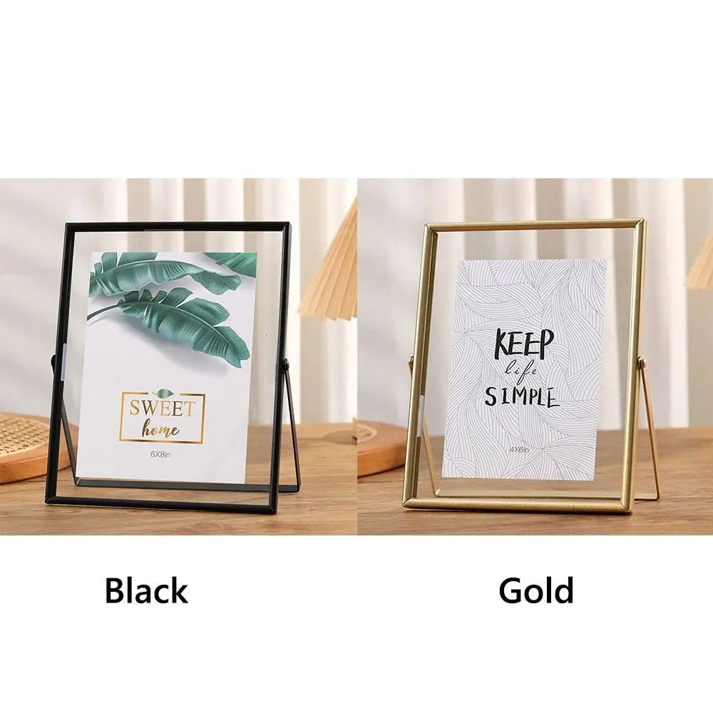 Modern metal and acrylic photo frame displayed in black and gold finishes.