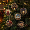 Christmas diamond painting ornaments featuring Santa, snowman, and reindeer pendants hanging on a green fir tree.