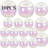 A pack of ten iridescent metallic rainbow foil balloons reflecting light.