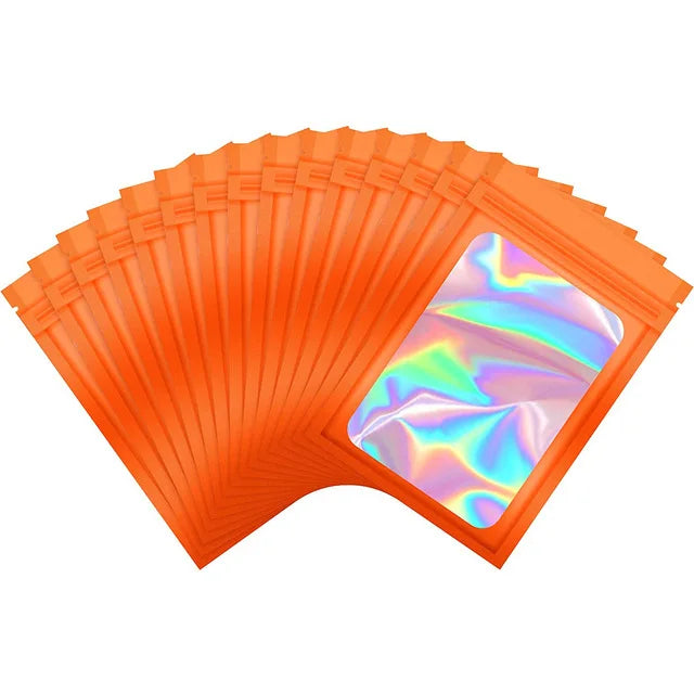 Sacs de stockage scellables à fermeture éclair laser orange de style accordéon, vue de dessus.